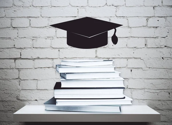 Abstract levitating mortarboard above shelf with book pile. Brick wall background. Education concept. 3D Rendering — Stock Photo, Image