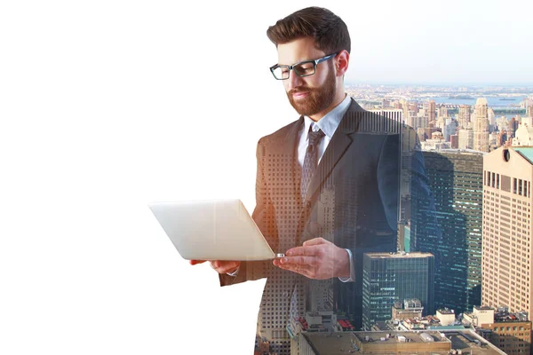 Businessman using laptop multiexposure — Stock Photo, Image