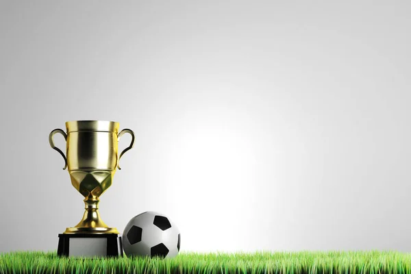 Gyllene vinnarens cup med fotboll placeras på gräs. Grå bakgrund med kopia utrymme. Mästerskapet koncept. 3D-rendering — Stockfoto