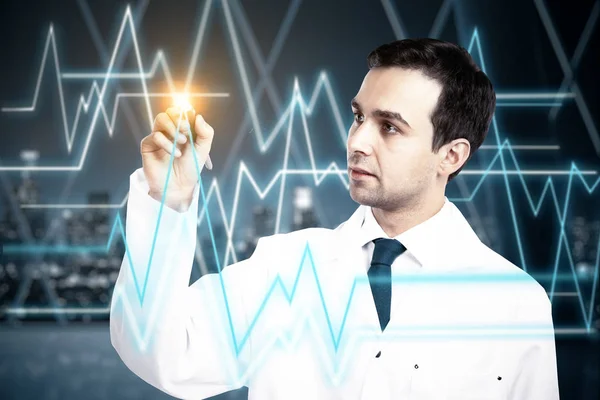 Young male doctor drawing abstract heartbeat line on night city background. Medicine concept — Stock Photo, Image