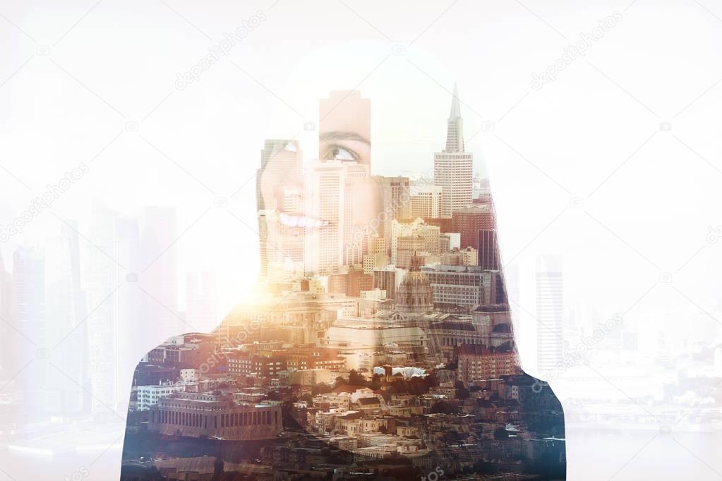 Smiling woman in city multiexposure 