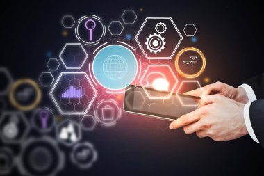 El ile bulanık koyu arka plan üzerinde parlayan iş hologram tablet kullanma. Teknoloji kavramı. 3D render 