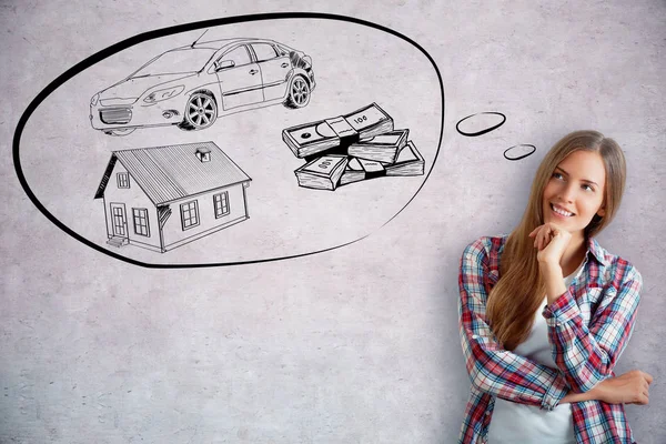 Attractive smiling young woman dreaming of wealth on concrete background. Rich concept — Stock Photo, Image