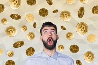 Bitcoins ile şaşırmış adam 