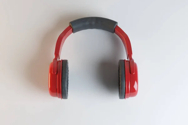 Piros fejhallgató és fülhallgató-ra könnyű háttér. Zenei koncepció. 3D-leképezés — Stock Fotó