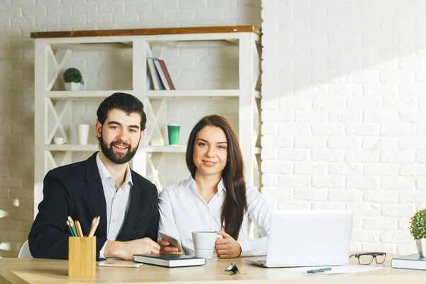 Handsome man and woman working together — Stock Photo, Image
