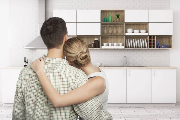 Visão traseira do jovem casal europeu olhando para o interior da cozinha moderna. Conceito familiar. Renderização 3D — Fotografia de Stock