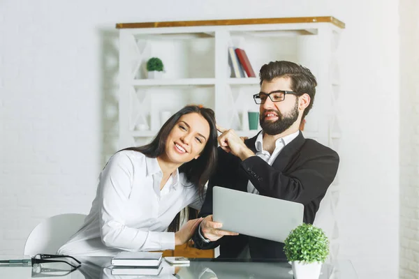 Businessman and woman playing at workplace. Playful concept — Stock Photo, Image