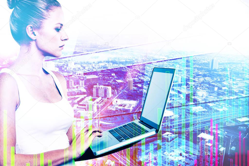 Side view of young woman using laptop on abstract city background with business chart. Trading concept. Double exposure 