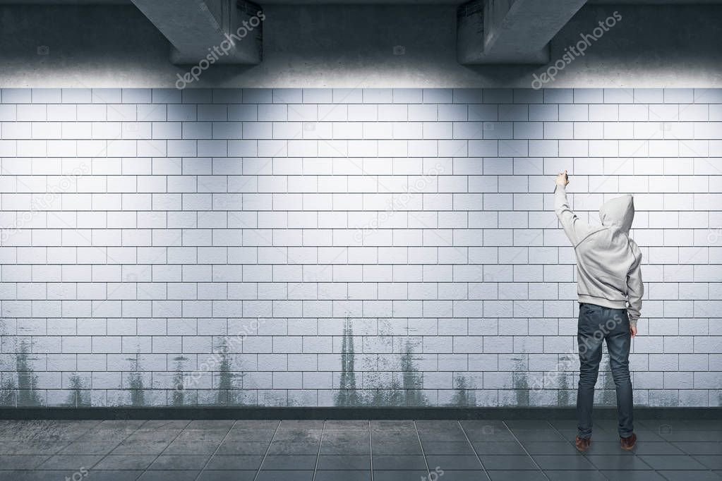 Man painting graffiti 