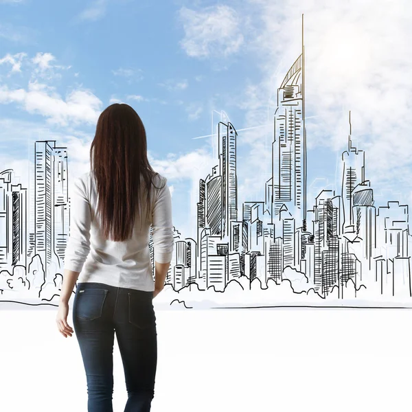 Mujer mirando la ciudad dibujada — Foto de Stock