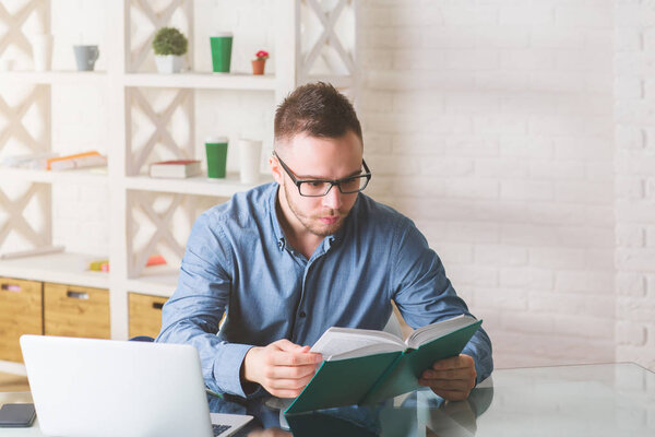 White guy working on project 