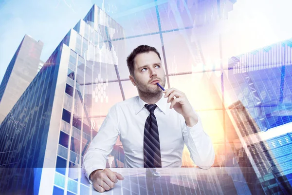 Empresário atraente com holograma de negócios — Fotografia de Stock