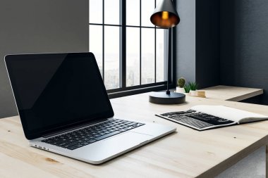 Dizüstü bilgisayar tarafı ile çağdaş İşyerinde