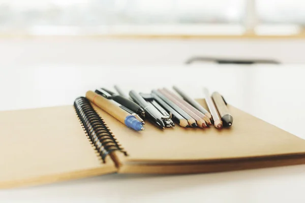 Notepad and pens — Stock Photo, Image