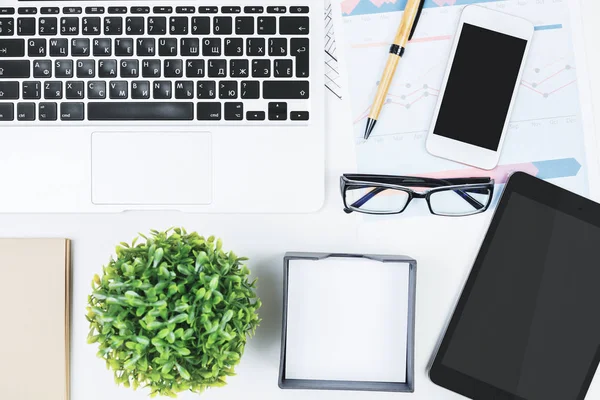 White workplace with laptop and other items — Stock Photo, Image