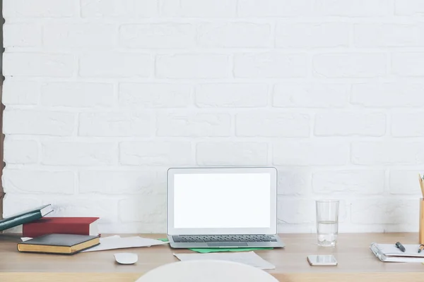 Designer workplace with empty laptop screen — Stock Photo, Image