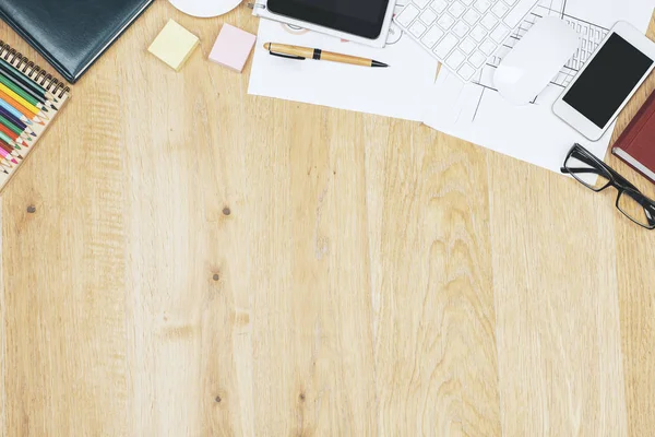 Contemporary tabletop with tablet and supplies — Stock Photo, Image