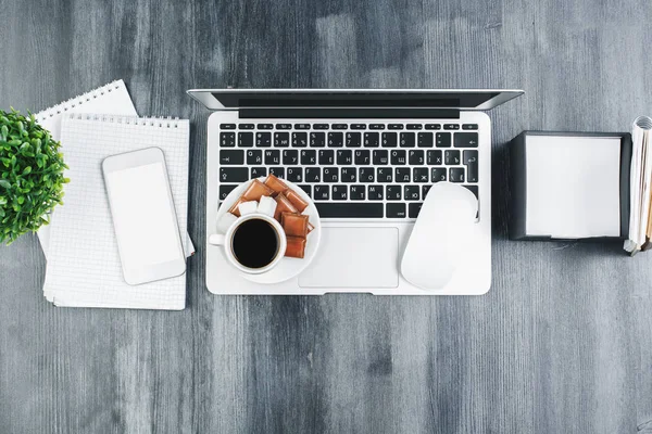 Stylish wooden desktop with items