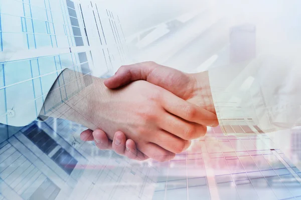 Handshake on city background — Stock Photo, Image