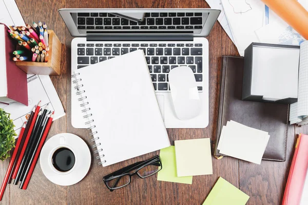 Wooden desk top with office items and devices — Stock Photo, Image