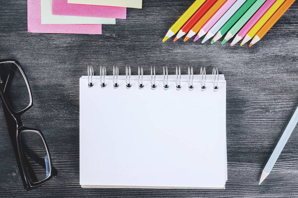 Modern desktop with blank notepad