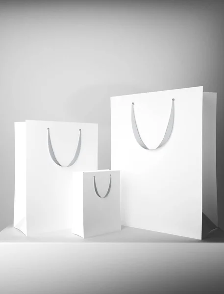 Empty white shopping bags — Stock Photo, Image