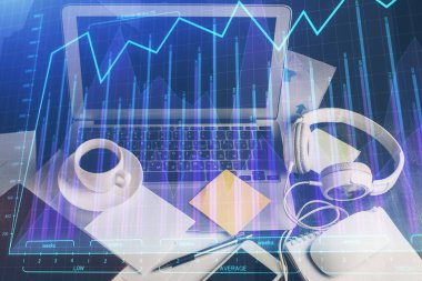 Finansal grafik renkli çizimler ve arka planda bilgisayar olan tablolar. Çifte maruziyet. Uluslararası pazarlar kavramı.