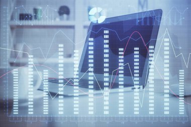 Finansal tablo çizimi ve arka planda bilgisayar olan bir tablo. Çoklu maruz kalma. Uluslararası pazarlar kavramı.