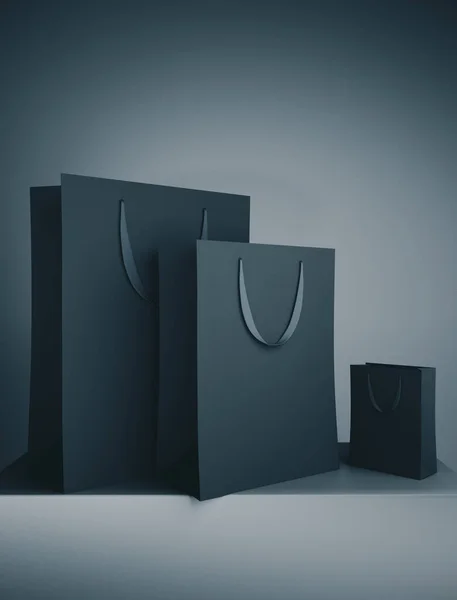 Tres negro bolsa de compras . — Foto de Stock