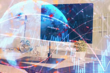 Finansal grafik renkli çizimler ve arka planda bilgisayar olan tablolar. Çoklu maruz kalma. Uluslararası pazarlar kavramı.