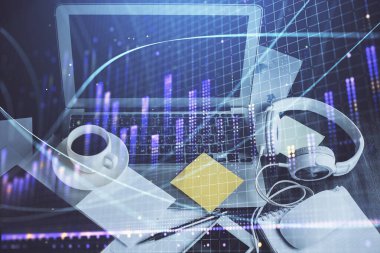 Finansal tablo çizimi ve arka planda bilgisayar olan bir tablo. Çifte maruziyet. Uluslararası pazarlar kavramı.