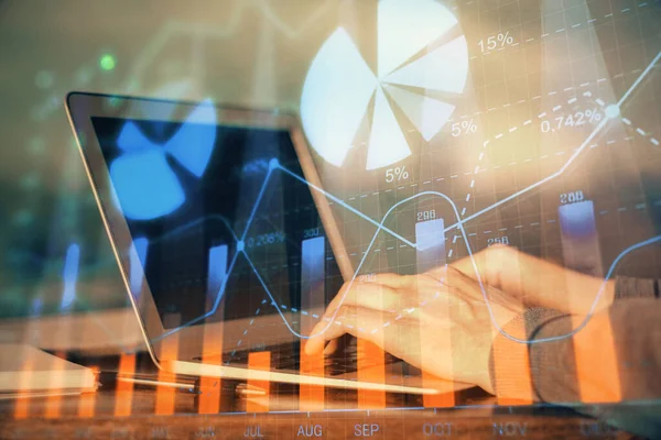 Double exposure of mans hands writing notes with laptop of stock market with forex graph background. Top View. Concept of research and trading. — Stock Photo, Image