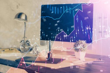 Finansal grafik renkli çizimler ve arka planda bilgisayar olan tablolar. Çoklu maruz kalma. Uluslararası pazarlar kavramı.