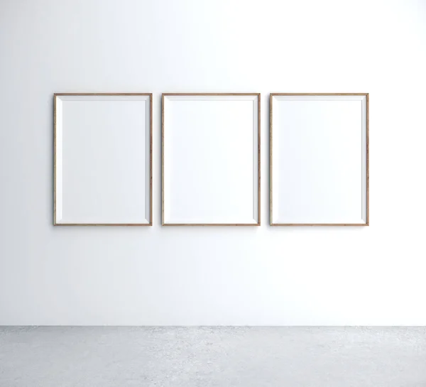 Три плаката на стене — стоковое фото