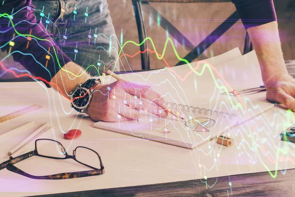 Gráfico de comercio financiero doble exposición con fondo de escritorio hombre. —  Fotos de Stock