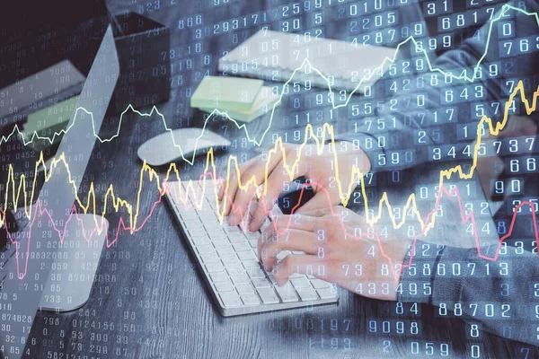 Stock graph with businessman typing on computer in office on background. Concept of analysis. Double exposure. — Stock Photo, Image