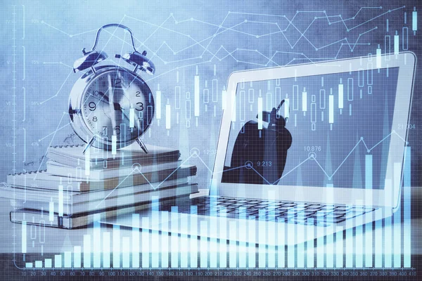 Double exposure of graph and financial info and work space with computer background. Concept of international online trading.