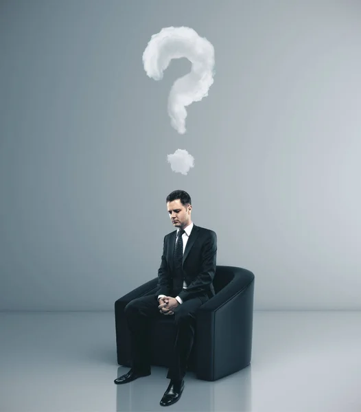 Businessman with drawing question mark — Stock Photo, Image