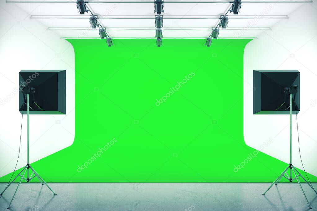 Photo studio with empty green background