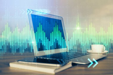Finansal tablo çizimi ve arka planda bilgisayar olan bir tablo. Çoklu maruz kalma. Uluslararası pazarlar kavramı.