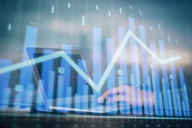 Forex grafik arka plan ile borsa dizüstü bilgisayar ile notlar yazma mans elçift pozlama. Üst Görünüm. Araştırma ve ticaret kavramı.