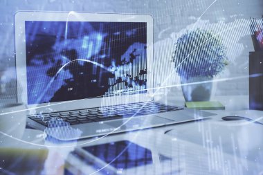 Kişisel bilgisayar arkaplanına çizilmiş borsa hologramı. Çifte maruziyet. Yatırım kavramı.