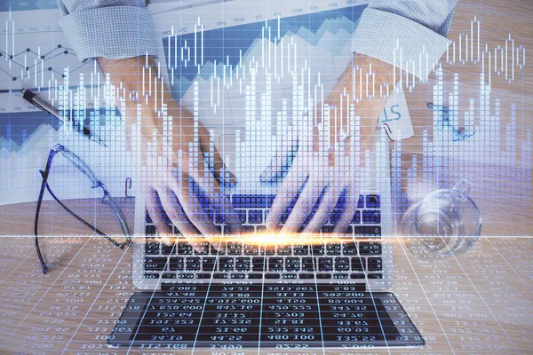 Double exposure of market chart with man working on computer on background. Concept of financial analysis. — Stock Photo, Image