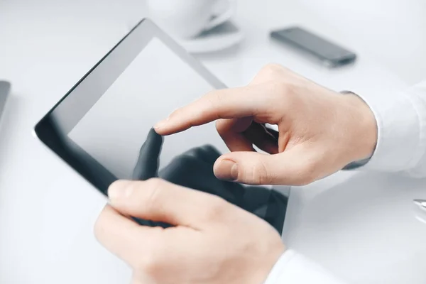 Businessman hand touching touch pad. — Stock Photo, Image