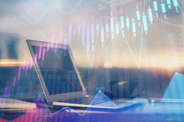 Arka planda eski pazar grafik hologramı ve kişisel bilgisayar var. Çoklu maruz kalma. Yatırım kavramı.