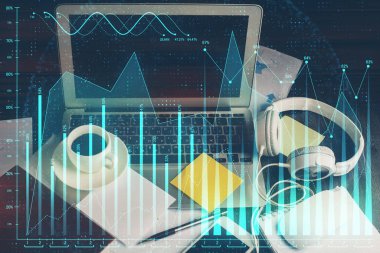 Finansal grafik renkli çizimler ve arka planda bilgisayar olan tablolar. Çoklu maruz kalma. Uluslararası pazarlar kavramı.