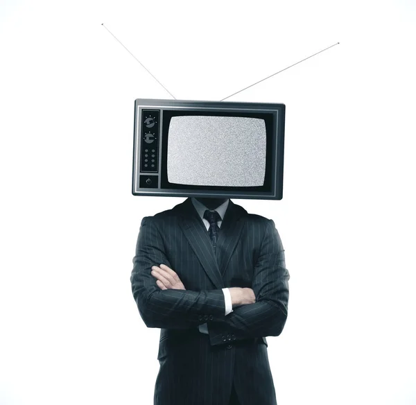 Üzletember öltönyben a régi TV helyett — Stock Fotó