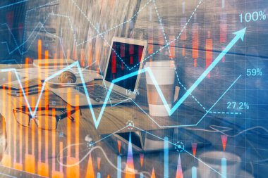 Finansal grafik renkli çizimler ve arka planda bilgisayar olan tablolar. Çoklu maruz kalma. Uluslararası pazarlar kavramı.