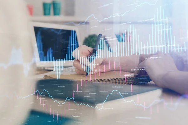 Financial graph displayed on womans hand taking notes background. Concept of research. Double exposure — Stock Photo, Image